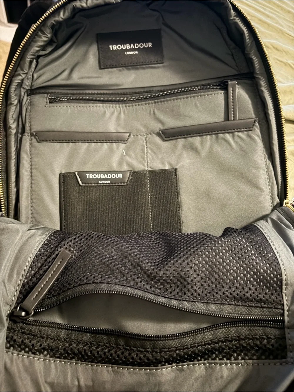 Sophisticated Black Women's Backpack with Gold Hardware